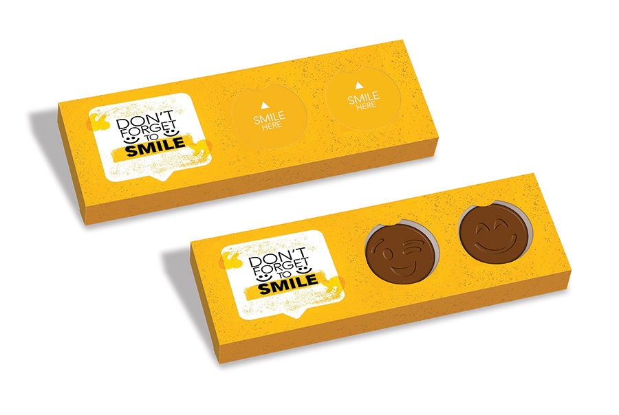 Logo trade reklaamtoote pilt: Šokolaadist naerunäod pakendis