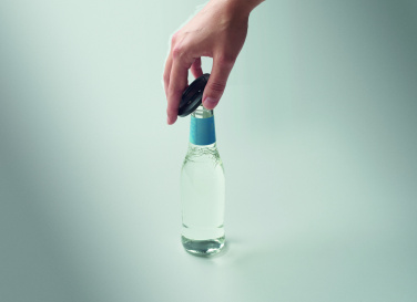 Logo trade liikelahjat mainoslahjat kuva: Puhelinpidike ja pullonavaaja