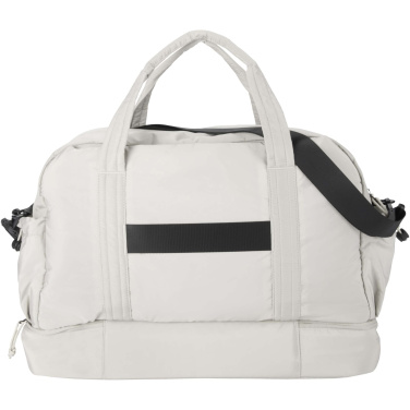 Логотрейд бизнес-подарки картинка: Дорожный мешок Puffer объемом 30 л, изготовленный из переработанных материалов согласно стандарту GRS, с утепленным дном